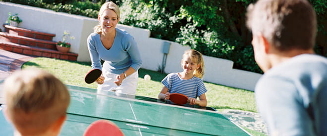 family playing ping pong